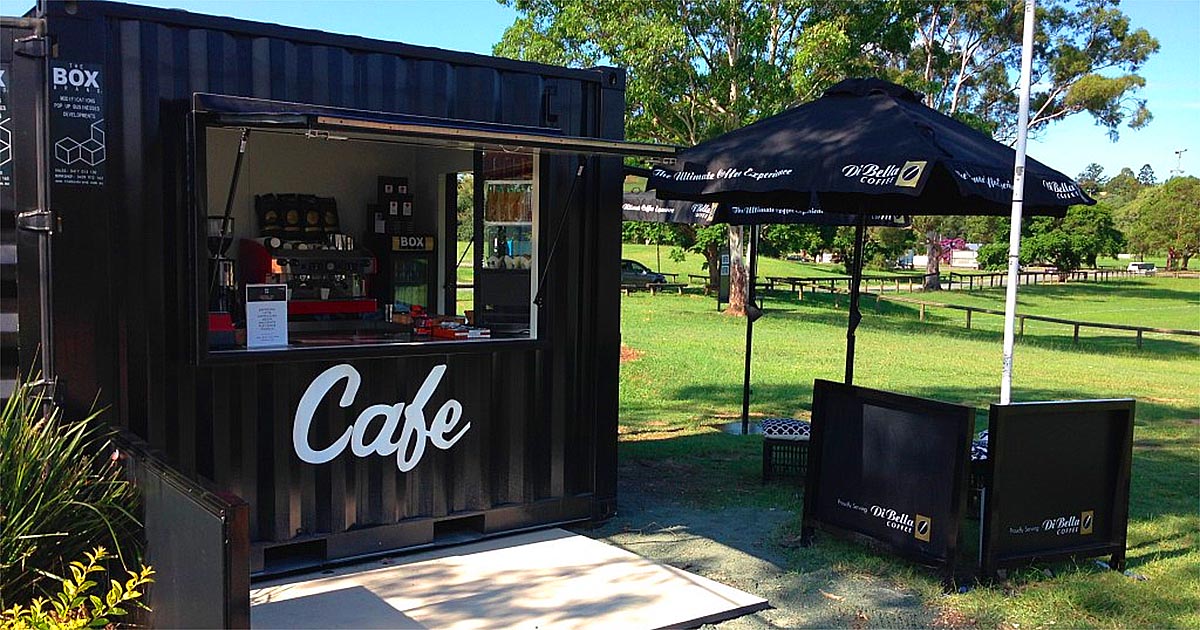 black shipping container pop up cafe