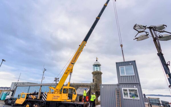 crane st peter port pier light house container control centre