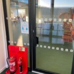sliding frameless glass entrance lobby glass door