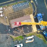 shipping container 2 installation beadnell bay beach car park aerial photo