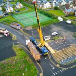 yellow crane container installation