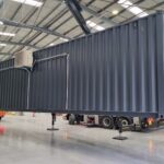 40ft grey shipping container crane warehouse