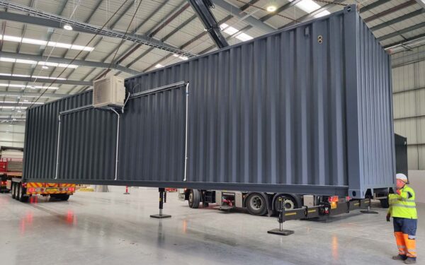 40ft grey shipping container crane warehouse
