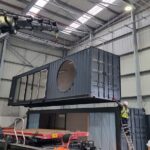 loading container 3 onto flatback hgv