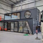 preparing glazing for transportation shipping container