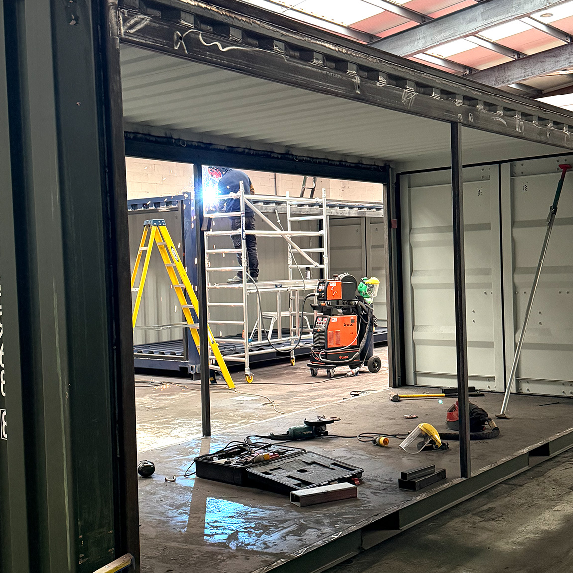 Wall frame construction switch-gear container build