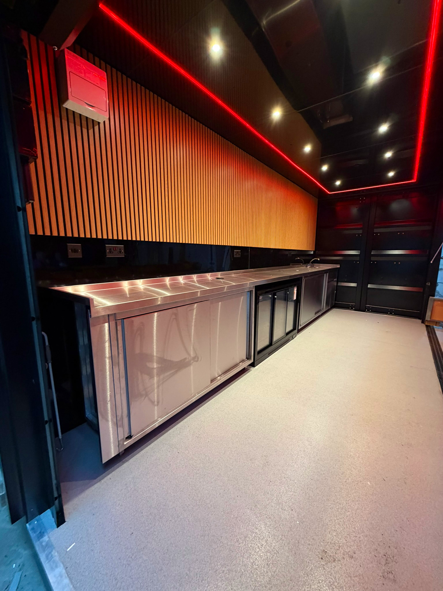 Inside catering unit neon lighting modern trendy design